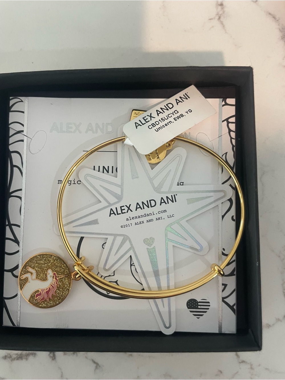 Alex and Ani Gold Tone Expandable Bangle with Signature Charms